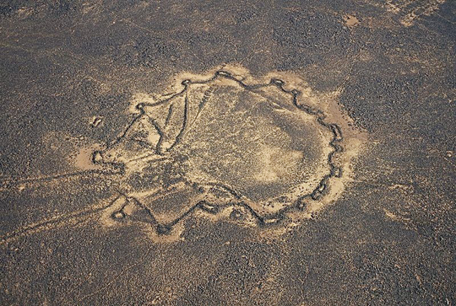 Remains of an ancient desert kite between As Safawi and Qasr Burqu, Mafraq, Jordan (Photo courtesy of Amusing Planet)