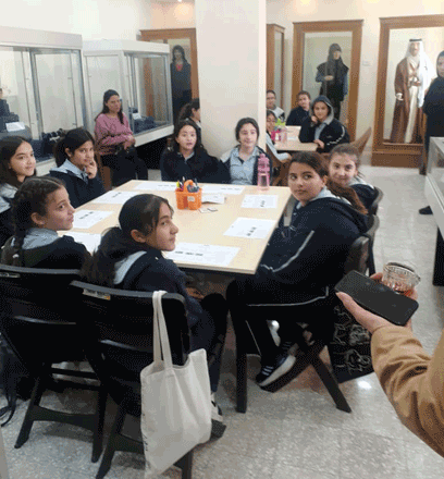 Schoolchildren attend a workshop on cultural preservation in Madaba on Saturday (Photo by Saeb Rawashdeh)