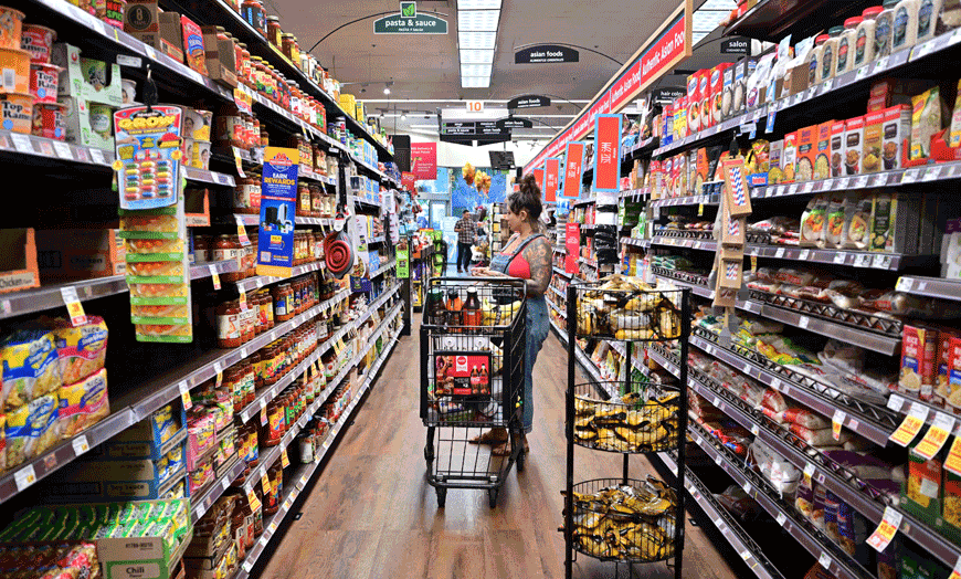 A woman shops for groceries at a supermarket in Monterey Park, California, on October 19, 2022 (AFP photo)
