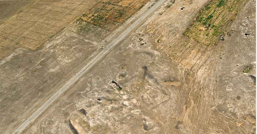 The aerial view of the site Teleilat Ghassul located in the lower eastern Jordan Valley (Photo courtesy of APAAME)