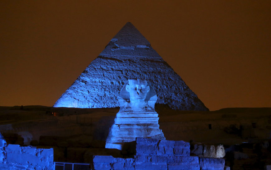 The Great Pyramids and Sphinx reflect blue light during a celebration for the 70th anniversary of the United Nations in Giza, Egypt, on Saturday (Reuters photo)
