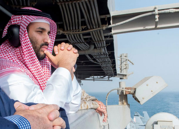 A handout picture released on Wednesday by the Saudi Press Agency shows Saudi Deputy Crown Prince and Minister of Defence Mohammed Bin Salman looking at the flight deck during a visit to the USS aircraft carrier Theodore Roosevelt (AFP photo/ HO/ SPA)