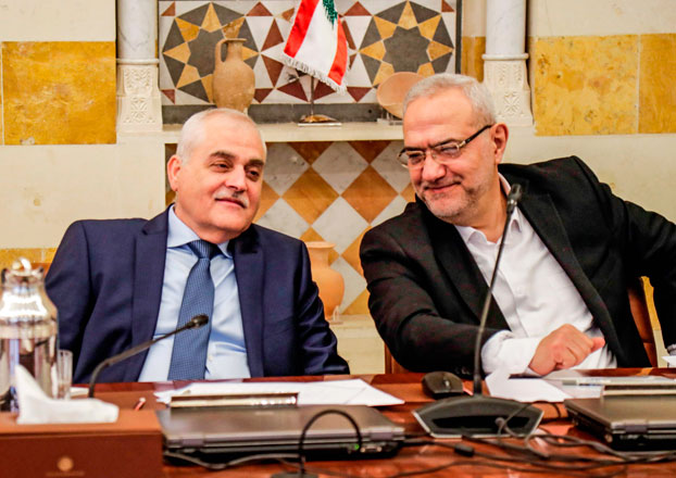 Jamil Jabak, Lebanon's new Health Minister (left) and new Minister of State for Parliamentary Affairs Mahmoud Qmati attend the first Cabinet meeting at the presidential palace in Baabda, east of the capital Beirut, on Saturday (AFP photo)