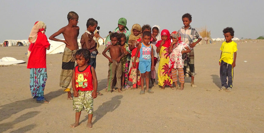Imad (centre) and his sister Alia (foreground) are photographed with friends at Al Waara camp in the Khokha district, some 30 kilometres from the town of Hays, on Monday (AFP photo)
