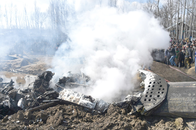 Smokes billows from the remains of an Indian Air Force helicopter after it crashed in Budgam district, on the outskirts of Srinagar, on Wednesday (AFP photo)