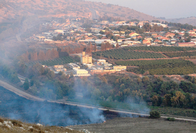 This photo taken on Sunday from a location near the southern Lebanese town of Maroun Al Ras, close to the border with Israel, shows smoke rising from fires along the border with Israel on the Lebanese side following an exchange of fire (AFP photo)