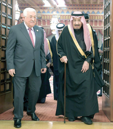 In this handout photo from the Palestinian President Office Saudi Arabia's King Salman Bin Abdulaziz meets with Palestinian President Mahmoud Abbas in Riyadh, Saudi Arabia, on Tuesday (Reuters photo)