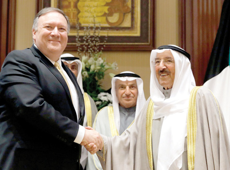 US Secretary of State Mike Pompeo (left) is welcomed by Kuwait's Emir Sheikh Sabah Al Ahmad Al Jaber Al Sabah in Kuwait City on Wednesday (AFP photo)