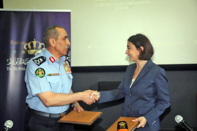 HRH Princess Rym Ali  and Maj. Gen. Fadel Hmoud during the signing ceremony of a renewal agreement for the ‘Cinema for All’ project in Amman on Wednesday (Petra photo)