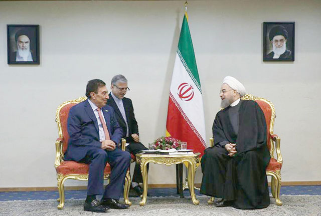 Iranian President Hassan Rouhani receives Lower House Speaker Atef Tarawneh in Tehran on Wednesday (Petra photo)