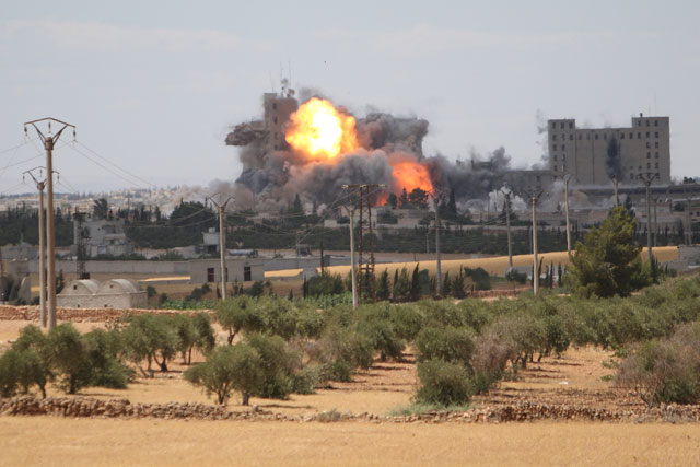 Smoke and flame rise after what fighters of the Syria Democratic Forces said were US-led air strikes on the mills of Manbij where Daesh militants are positioned,  in Aleppo Governorate, Syria, on Thursday (Reuters photo)
