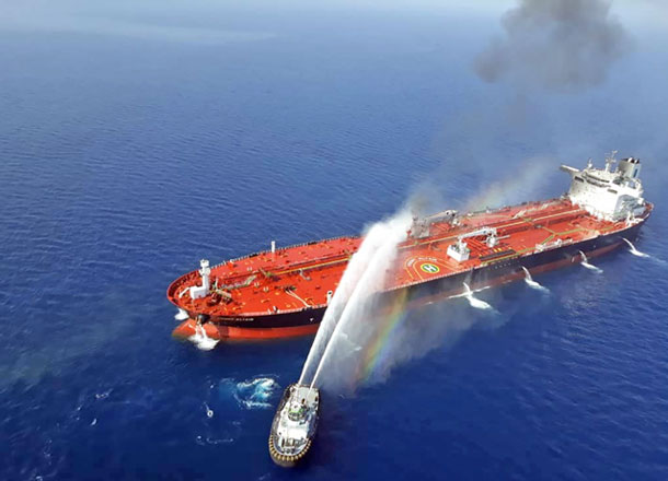   This file photo obtained by AFP from Iranian news agency Tasnim on June 13, reportedly shows an Iranian navy boat trying to control fire from Norwegian owned Front Altair tanker said to have been attacked in the waters of the Gulf of Oman (AFP photo)
