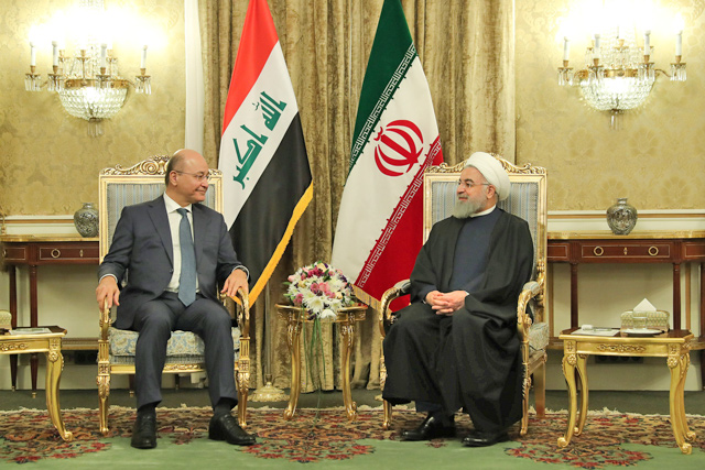 This handout photo released by the official website for the Iranian president shows Iran’s President Hassan Rouhani meeting with Iraq’s President Barham Saleh in Tehran, Iran, on Saturday (Reuters photo)