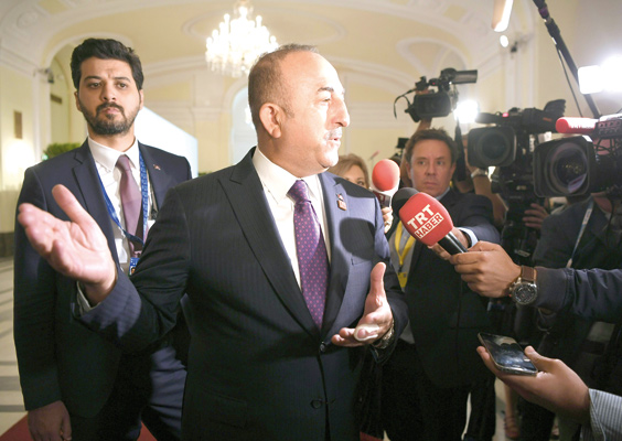 Turkish Foreign Minister Mevlut Cavusoglu gives a statement during an informal meeting of EU - foreign ministers (Gymnich) in Vienna, Austria, on Friday (AFP photo)