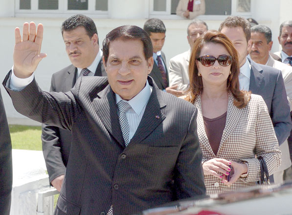 In this file photo taken on May 09, 2010, former Tunisian president Zine Al Abidine Ben Ali  waves to wellwishers after voting for the municipal elections next to his wife Leila (AFP photo)