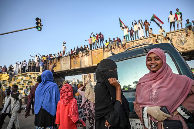 Sudanese protesters gather during a sit-in outside the army headquarters in the capital Khartoum on Tuesday (AFP photo)