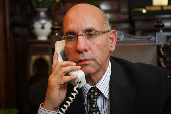A photo taken on March 8 shows Egypt’s Agriculture Minister Salah Halal speaking on the phone at his office in Cairo (AFP photo)