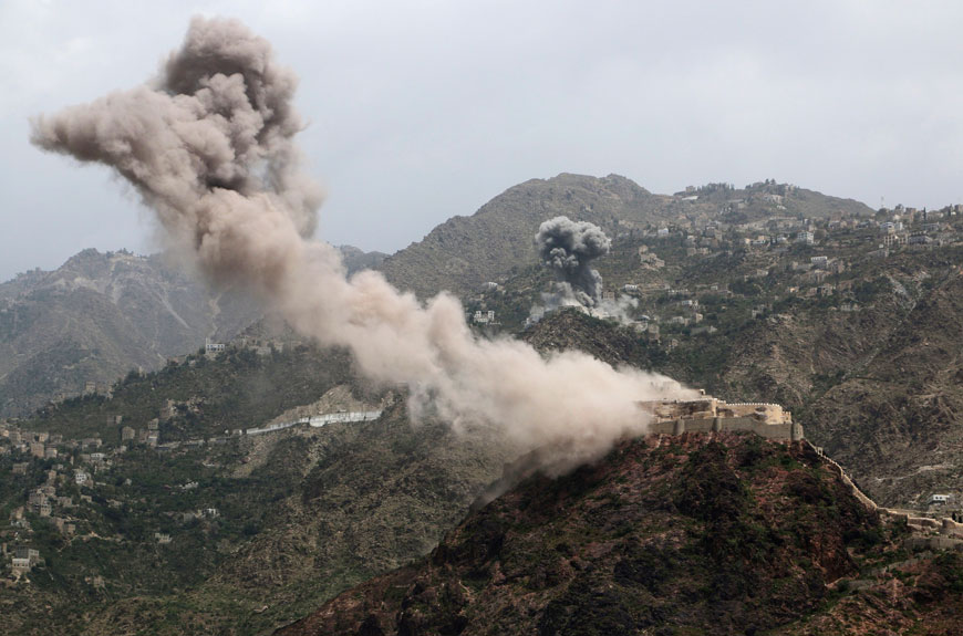 Smoke rises from Al Qahira castle, an ancient fortress that was recently taken over by Shiite rebels, and another building on the Saber mountain, in the background, following Saudi-led air strikes in Taiz city, Yemen, on Thursday (AP photo)