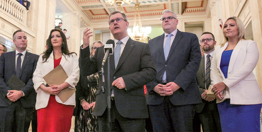 Northern Ireland Democratic Unionist Party leader Jeffrey Donaldson (centre) speaks to press on the great hall of the Parliament Building of the Northern Ireland Assembly, in Stormont on Saturday as the Northern Ireland Assembly prepares to sit and elect a Sinn Fein first minister of Northern Ireland (AFP photo)