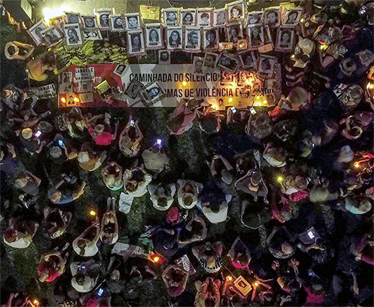 Relatives and social activists hold a silent march in memory of the victims of the 1964 Brazilian coup d’etat during the 40th anniversary commemoration, in Sao Paulo, Brazil, on Sunday (AFP photo)