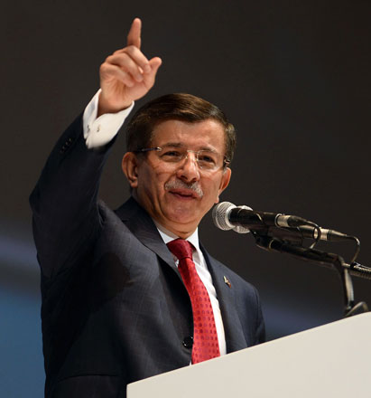 Turkish Prime Minister Ahmet Davutoglu gestures as he gives a speech during the 5th edition of the ruling Justice and Development Party (AKP) annual congress in Ankara, on Saturday (AFP photo)
