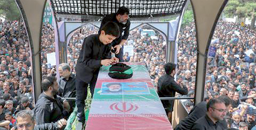 A handout photo provided by the Iranian presidency shows the coffin of late Iranian president Ebrahim Raisi during a funeral procession in the eastern city of Birjand on Thursday (AFP Photo)
