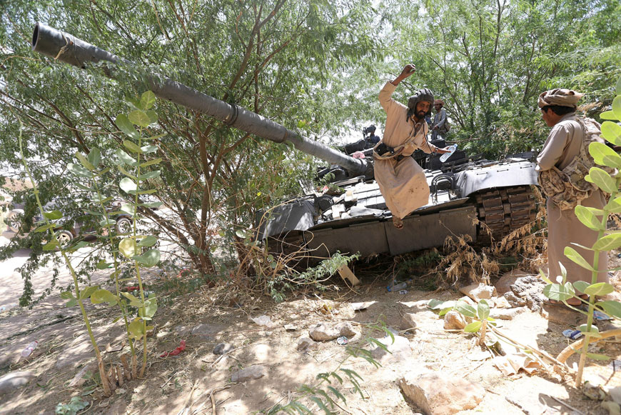 Soldiers loyal to Yemen’s government ride on a tank in the frontline province of Marib, on Thursday (Reuters photo)