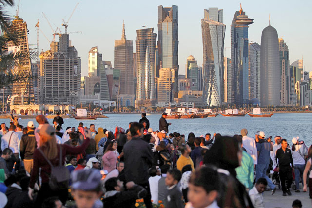 In this file photo taken on December 18, 2017, people take part in Qatar's National Day celebrations in Doha (Reuters photo)