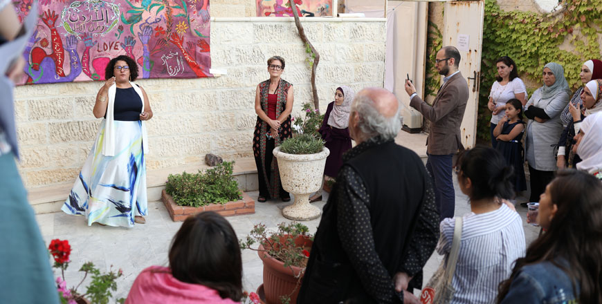Yafa Shanneik inaugurates the art exhibition 'Narratives of displacement' at the British Institute in Amman on Wednesday  (Photo by Emily Nevils)