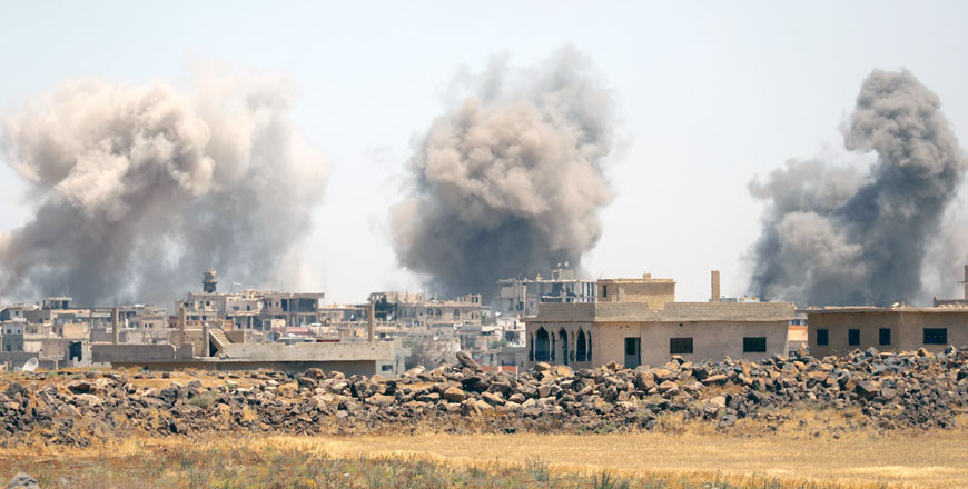 Smoke rises from Al Harak town, as seen from the Deraa countryside, Syria, on Monday (Reuters photo)