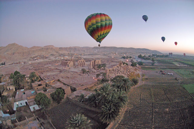 This file photo taken on November 15, 2007, shows tourist hot air balloons floating during dawn across Egypt's Valley of the Kings, near Luxor (AFP photo)