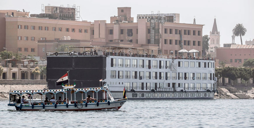 This photo taken on Tuesday shows the A-Sara Nile cruise ship docked in Egypt's southern city of Luxor, where 45 suspected COVID-19 coronavirus disease cases were detected and evacuated two days earlier (AFP photo)