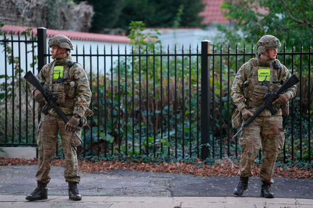 Military Police guard the perimeter of the Israeli embassy in Copenhagen, on October 2, 2024. Danish police said on Wednesday they were investigating two blasts that went off in an area near the Israeli embassy in the capital (AFP photo)