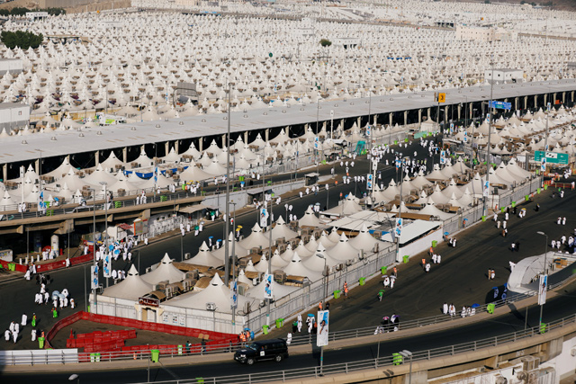 Muslim pilgrims walk towards their tents in Mina ahead of annual Hajj pilgrimage near the holy city of Mecca, Saudi Arabia, on Sunday (Reuters photo by Zohra Bensemra)