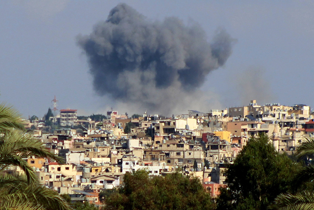 This picture taken from Lebanon's southern city of Tyre shows a smoke plume erupting following an Israeli air strike on the village of Tayrdebba on October 16, 2024 (AFP photo)
