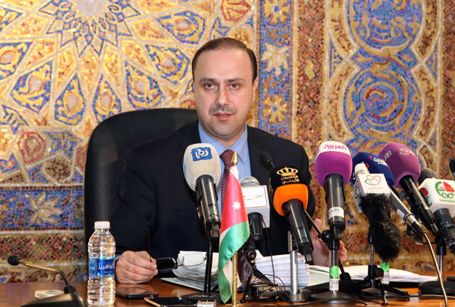 Minister of State for Media Affairs Mohammad Momani speaks to reporters in Amman on Monday (Petra photo)