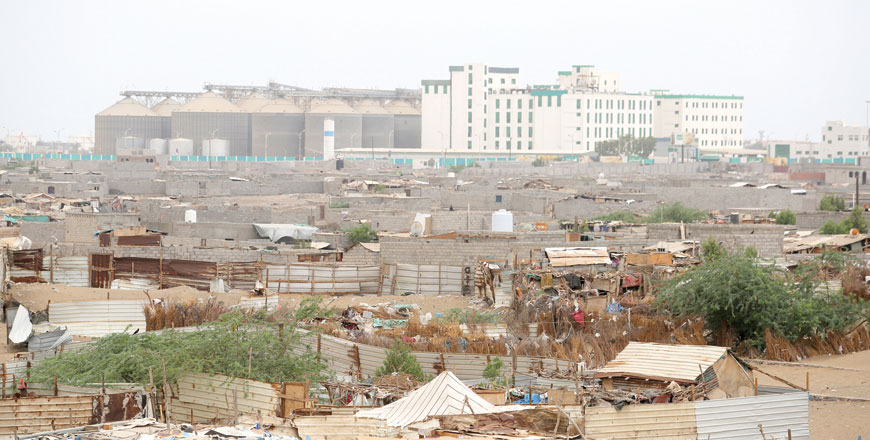 In this file photo, Hodeida port's grain silos are pictured from a nearby shantytown in Hodeida, Yemen, on June 16 (Reuters photo)