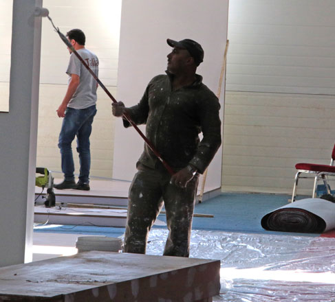 A worker paints the interior of a building in Amman on Monday. Unemployment is described by economists as the biggest challenge to the new government (Photo by Osama Aqarbeh)