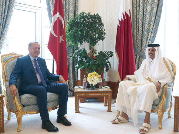 This handout photo provided by the Turkish Presidential Press Service shows Qatar's Emir Sheikh Tamim Bin Hamad Al Thani  meeting with Turkish President Recep Tayyip Erdogan in the Qatari capital Doha on Monday (AFP photo)