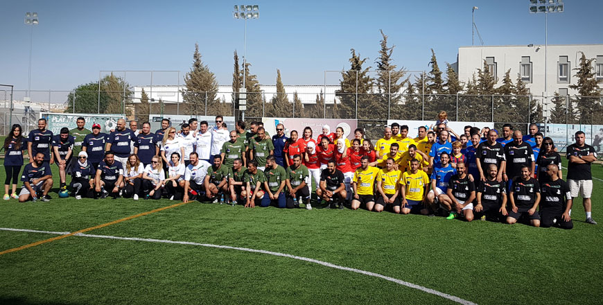 Participants in the ‘Score for Democracy’ event, organised by the EU, pose for a group photo, on Saturday  (Photo by Amjad Ghsoun)