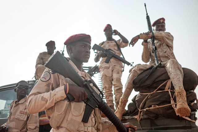 In this file photo taken on June 22, 2019, members of the Rapid Support Forces paramilitaries secure the place for a rally for supporters of Sudan's ruling Transitional Military Council in the village of Abraq, about 60 kilometres northwest of Khartoum (AFP photo)