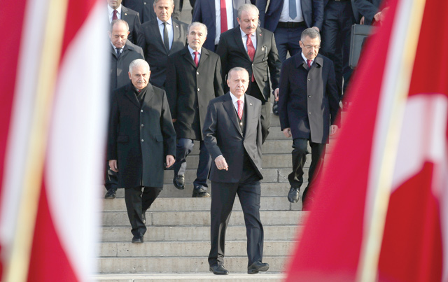 Turkish President Tayyip Erdogan attends a ceremony as he is flanked by top officials and army officers at the mausoleum of Mustafa Kemal Ataturk, marking Ataturk's death anniversary, in Ankara on Saturday (Reuters photo)