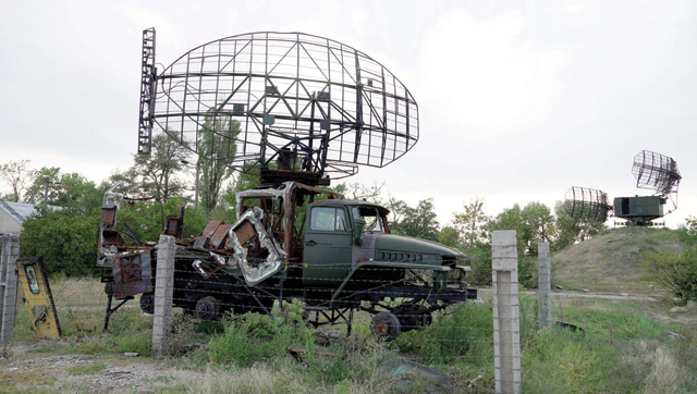 This photograph taken on Saturday shows destroyed Ukrainian military vehicles outside the city of Melitopol in Zaporizhzhia region, amid ongoing Russian military action in Ukraine (AFP photo)