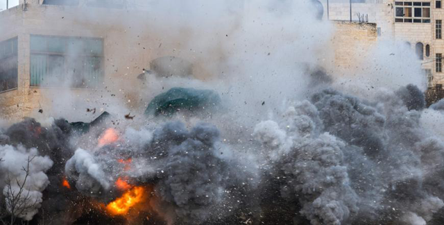 The house of a Palestinian man accused of an attack against Israelis in October 2024 in Jaffa, is blown up by Israeli security forces in Hebron, in the occupied west Bank on March 5, 2025 (AFP photo)