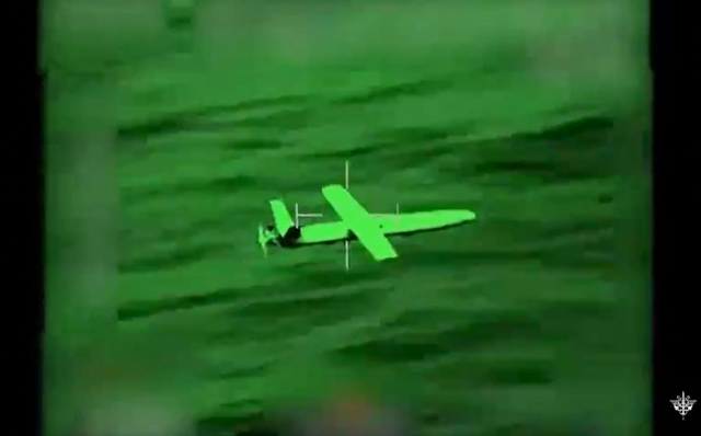 This handout grab of a video taken and released by the French 'Etat-Major des Armees' on March 20, shows a Houthi UAV threatening commercial navigation prior to its destruction by a French army helicopter from a French destroyer patrolling in The Red Sea  (AFP photo)
