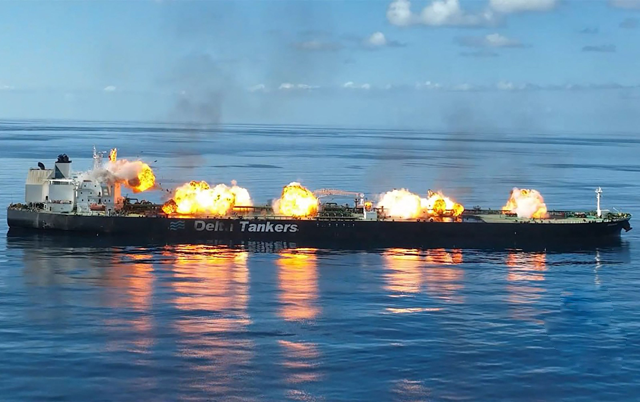 This picture released on August 29, 2024, by Yemen's Huthi Ansarullah Media Centre, shows fireballs and smoke errupting aboard what they say is the Greek-owned oil tanker Sounion (AFP photo)