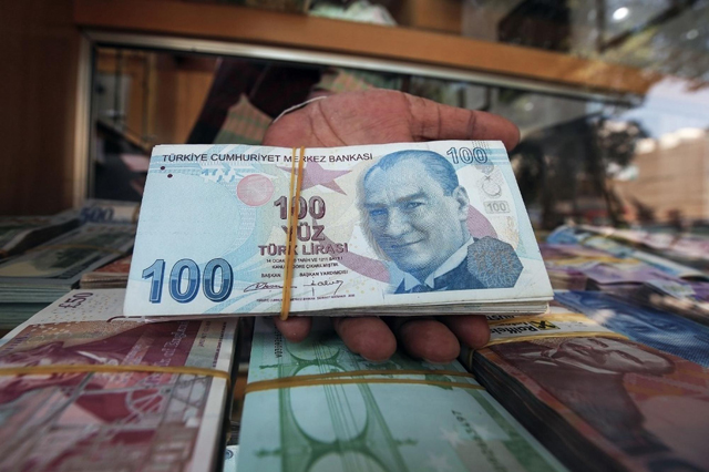 The value of the Turkish lira dropped significantly after the US president announced sanctions against Ankara (AFP file photo)