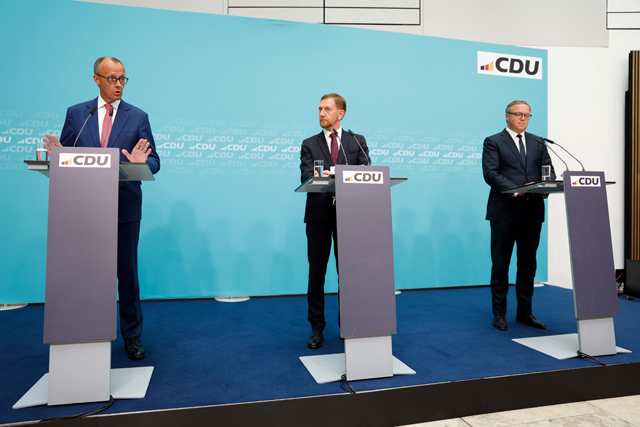 From left to right: Friedrich Merz, leader of Germany's conservative Christian Democratic Union (CDU) Party, and the CDU's top candidates for regional elections Saxony's State Premier Michael Kretschmer and Thuringia's Mario Voigt address a press conference following a CDU Party leadership meeting on Monday in Berlin (AFP photo)