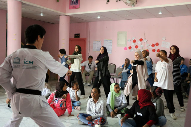   Volunteers from the Korea International Cooperation Agency are seen teaching students basic taekwondo moves (Photo courtesy of KOICA)