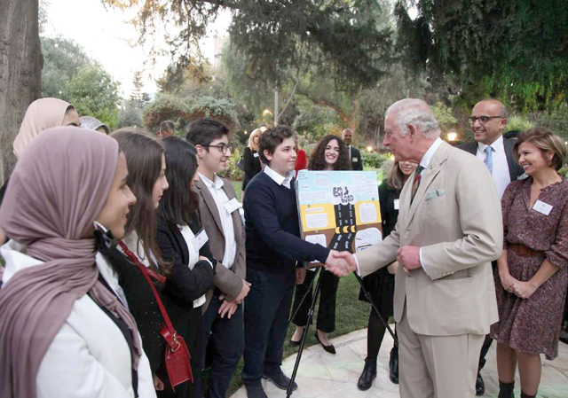 Prince Charles meet with young graduates of Prince’s Trust International at the British ambassador’s residence on Wednesday (Petra photo)